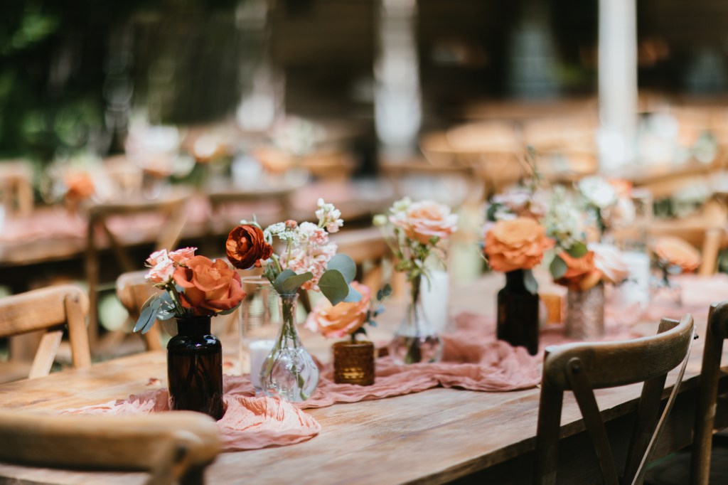 simple blush pink wedding table centerpieces with small vases